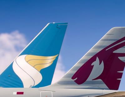 القطرية والطيران العماني يعقدان شراكة لاستبدال أميال السفر 